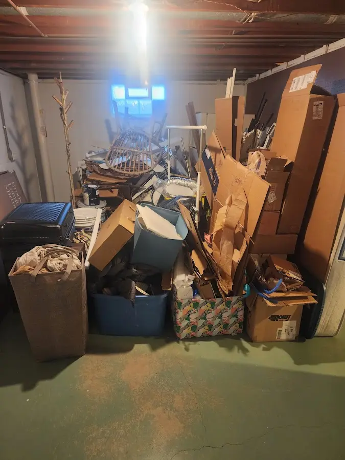 Roll-off dumpster container at job site for 15 Yard Dumpster Rental in Sugar Grove